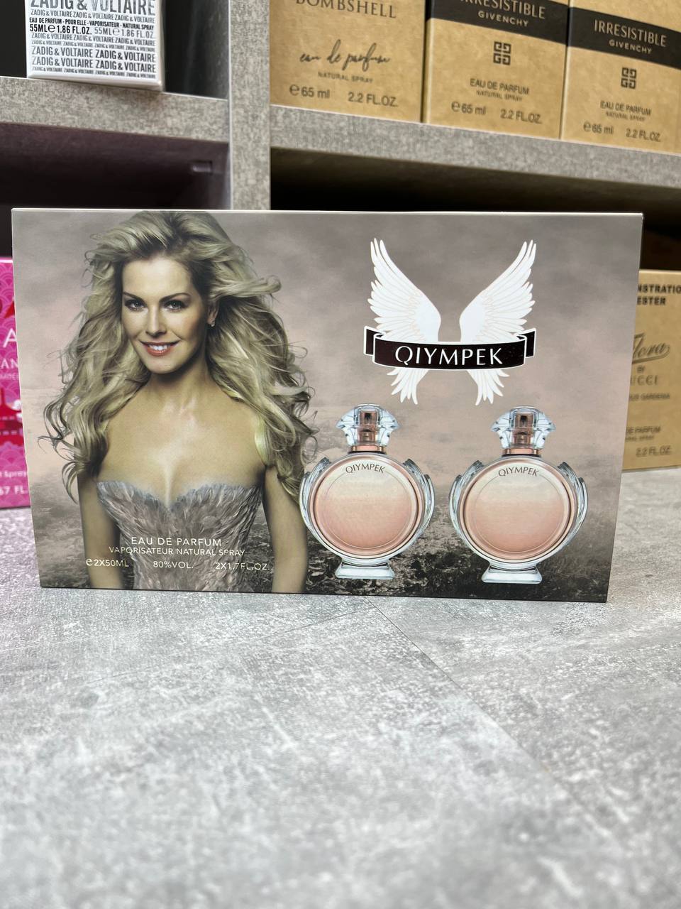 Подарочный набор парфюмерии QIYMPEK имитирует дизайн аромата Olympea от Paco Rabanne, представленный в флаконах в форме лаврового венка — изображение 2